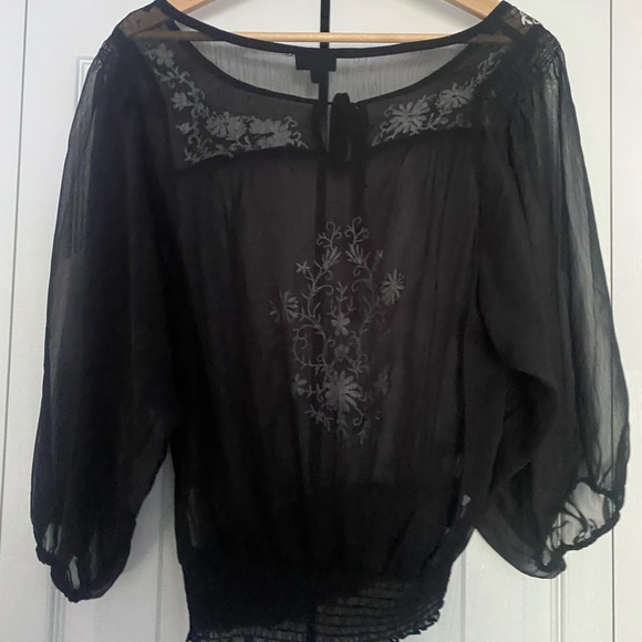 sheer black top with white floral detailing - Picture 2 of 3